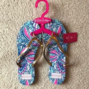 Lilly for target flip flops. “My Fans.” Brand new. Size 9.